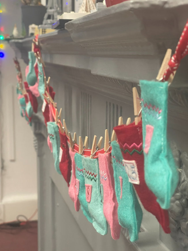 Stockings on a string Advent Calendar in the WJPS Office